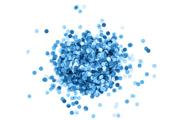 Heap of festive round paper blue confetti isolated on white. Festive concept.