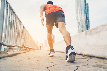 people doing exercises and warm up before running and jogging; Healthy lifestyle cardio together at outdoors