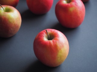 apples on black background