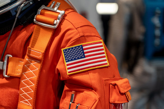 Close up of a USA flag on a space suit