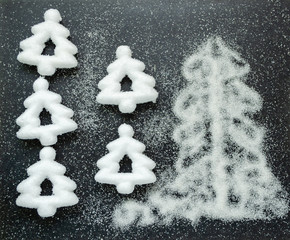 White crystalline sugar. Sugar decoration. Christmas tree, abstraction