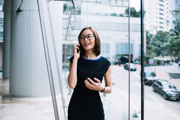 Beautiful Asian woman talking on phone