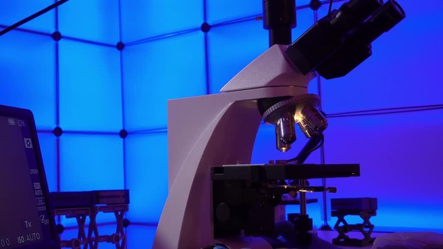 Microscope in science laboratory. Research of material structure