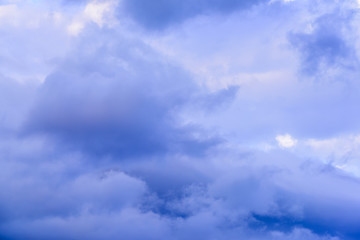 Dramatic puffy clouds isolated against blue skies