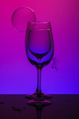 glass of wine on black background