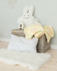 Merino wool baby blanket. Yellow blanket with plush toy