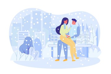 Couple in Warm Clothes Sitting on Bench in Park.