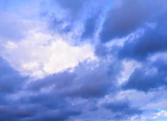 Dramatic puffy clouds isolated against blue skies