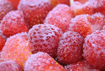 Frozen strawberries, vegiterian food, close-up