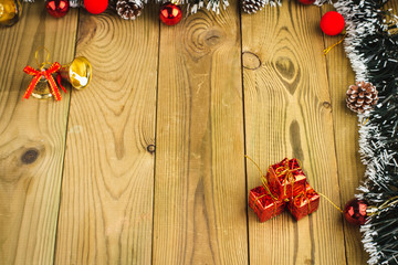 Christmas Decoration, Gifts tree branches and bells on wooden boards