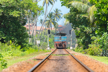 : Images from the exterior of the second category train car in Sri Lanka from Colombo to Matara....