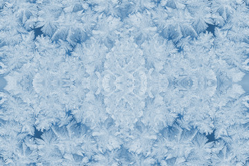 Kaleidoscope of frosty patterns in trendy 2020 Classic Blue. Christmas or New Year background.