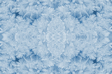Kaleidoscope of frosty patterns in trendy 2020 Classic Blue. Christmas or New Year background.
