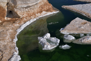 Winter landscape of frozen shoreline and icebergs, Lake Michigan, Frankfort, Michigan, USA