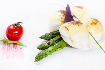Grilled asparagus with chicken pate and cheese.