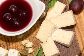 Cheese plate with sauce on a banquet table in a restaurant.