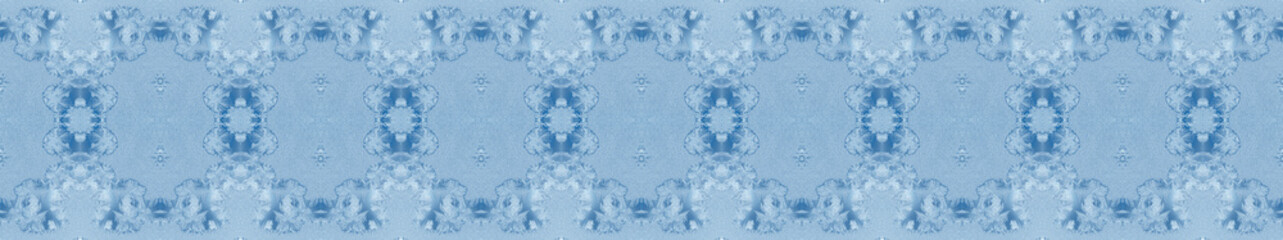 Christmas or New Year festive banner in trendy color 2020 Classic Blue. Collage of repeated frosty pattern on window.