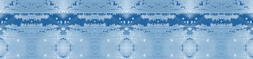 Christmas banner in trendy color 2020 Classic Blue. Collage of repeated frosty pattern on winter window.