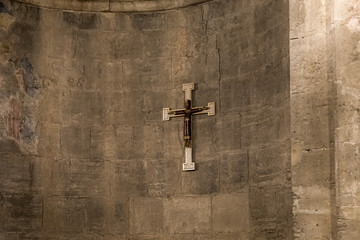 Crucifix hanging on the wall of the Benedictine Abbey of Abu Gosh in the Chechen village Abu Ghosh...