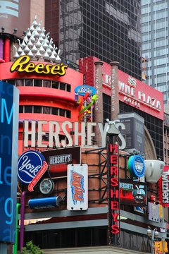 NEW YORK, USA - JULY 3, 2013: Famous Hershey's Ad At Times Square In New York. Hershey Company Is A Chocolate Manufacturer Founded In 1894. It Employs 13,700 People (2010).