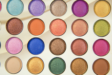 Colorful eye shadows palette. Makeup background. Colorful make-up palette