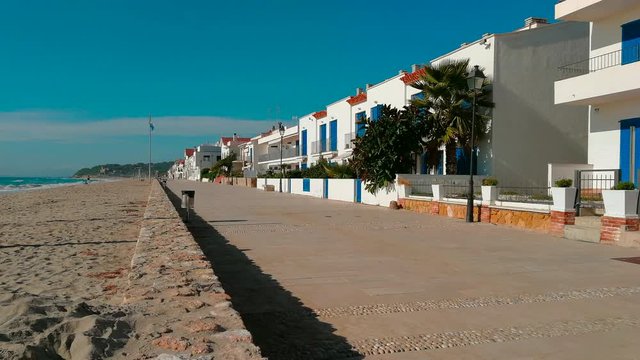 Seafront parallel to the Altafulla beach with its houses facing the Mediterranean Sea. Tarragona
