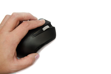 black computer mouse in hand isolated on a white background. Close-up.