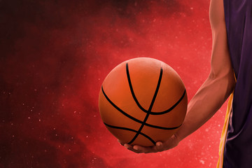 Basketball player holding a ball