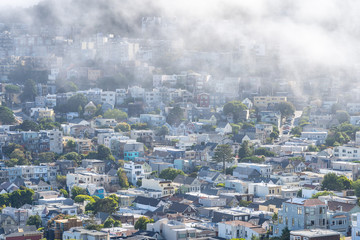 Fog over San Franciosco houses in California.
