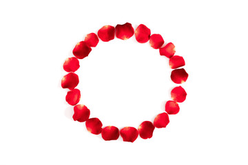 Obraz premium Beautiful flowers minimal composition. Wreath made of rose petals on white background. Valentine's Day, Happy Women's Day. Flat lay, top view, copy space