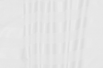 Obraz premium White Conton Cloth background with soft waves.