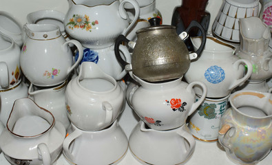 teapot and cups in the market window