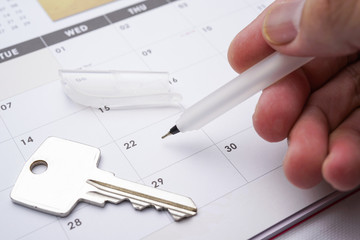 A Property conceptual, calendar with hand written vacant possession VP. The right of a purchaser to exclusive use of a property on completion of the sale