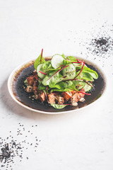 Vegan tofu poke bowl with baby chard and quinoa