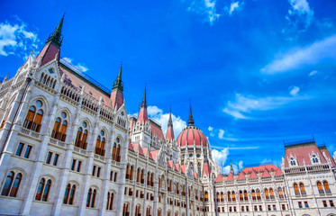 Fototapeta premium The Hungarian Parliament Building located on the Danube River in Budapest Hungary at sunset.