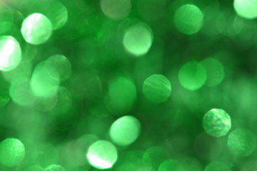 Obraz premium Green background,Defocused abstract green bokeh blurred circle light background