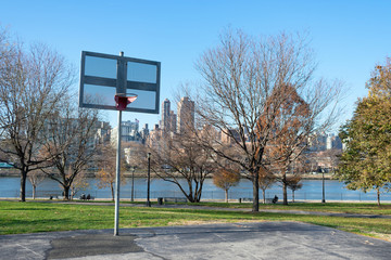 Basketball Hoop at Rainey Park in Astoria Queens New York during Autumn along the East River