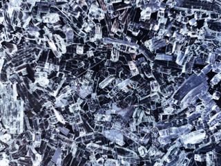 Texture of broken glass, shards. Abstract background.