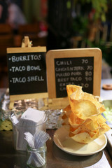 Homemade Mini size tortilla bowls and cup  perfect for appetizer portions with chalkboard background plastic fork side