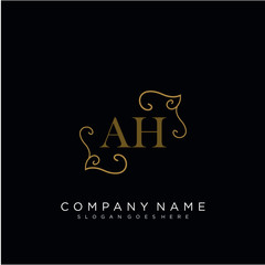 Initial letter AH logo luxury vector mark, gold color elegant classical