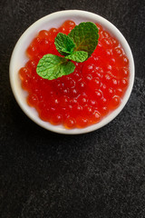 red caviar (seafood, salmon caviar) menu concept. food background. top view. copy space