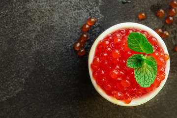 red caviar (seafood, salmon caviar) menu concept. food background. top view. copy space