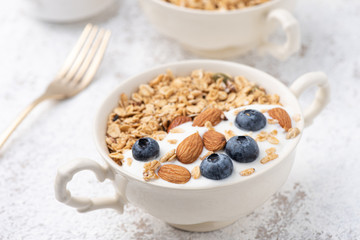 Granola, oatmeal with almond and berry food background