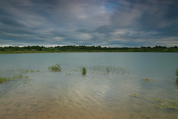 Naklejka premium gloomy autumn on the lake sadness / autumn stress, seasonal landscape nature on the lake