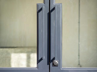 Stainless steel door handle and background photo