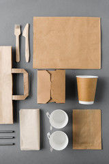 package, recycling and eating concept - disposable paper container for takeaway food with cups,...