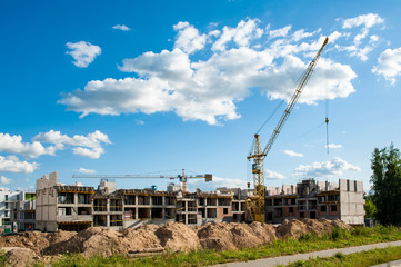 Residential building under construction on a sunny summer day