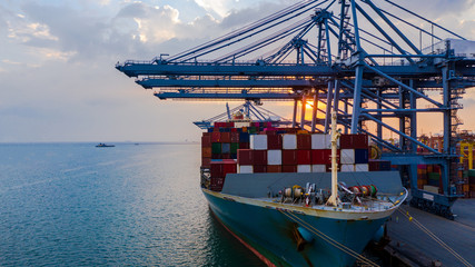 Aerial view container ship carrying container in import export business logistic and transportation...