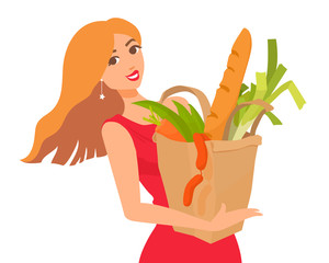 A beautiful blonde woman in a red dress holds a paper bag with groceries. Girl smiling, looking at a viewer. Fresh food. 