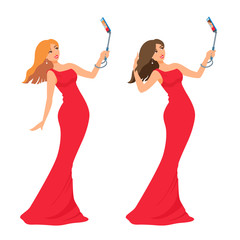 A beautiful blonde, brunette young adult woman in a red evening dress takes a selfie. Girl smiling, looking at a phone.